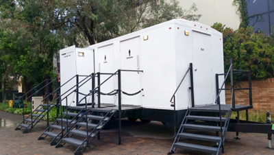 luxury portable toilets at an outdoor park